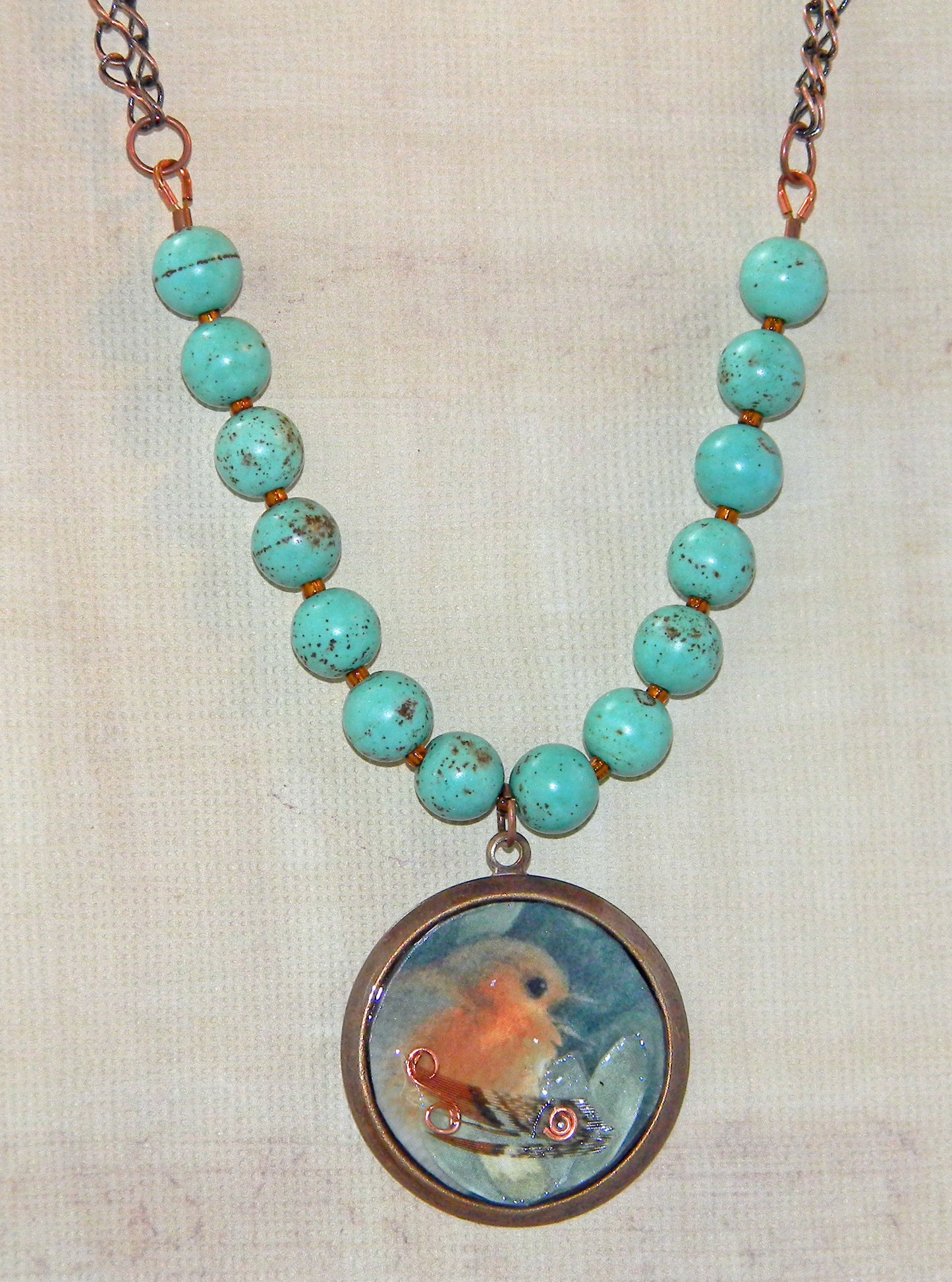 Bird in Resin Copper Bezel